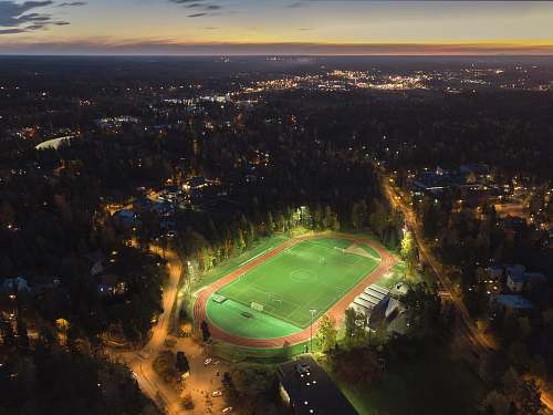 building birds eye photography of track field finland