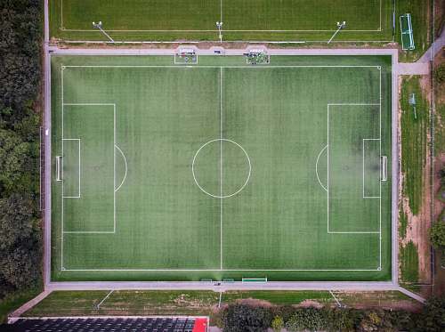 grey empty football field in aerial photgraphy arena