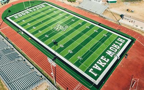 sports football field during daytime building