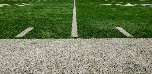 building green and gray grass field stadium