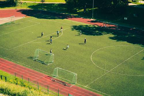 football people playing soccer on soccer field estonia