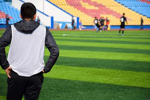 human person looking at soccer field person