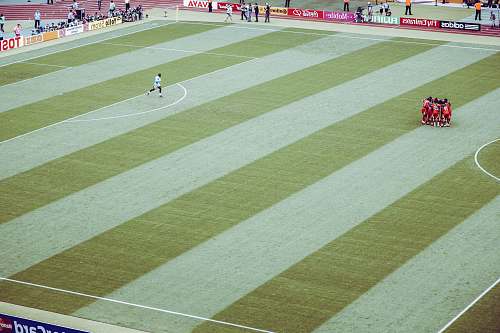 grass players making a group circle person