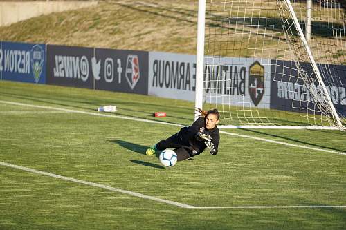 human woman playing soccer person