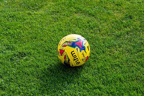 soccer yellow and blue soccer ball close-up photography ball