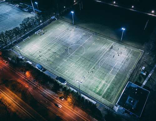 people aerial photography of football field field
