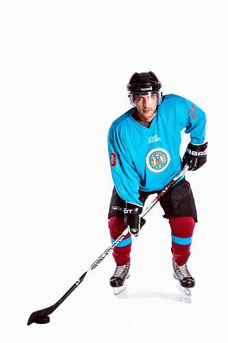 person air hockey player holding stick apparel