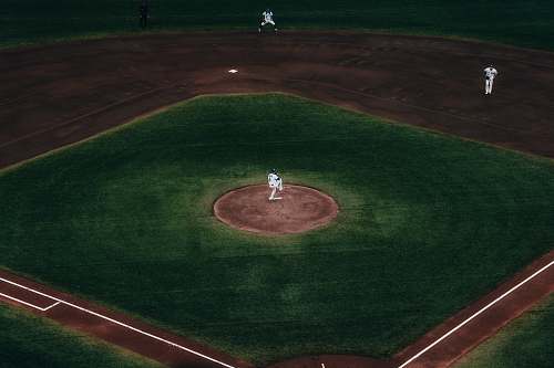 person baseball field close-up photography building