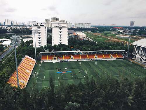 people bird's eye view of a green football field field
