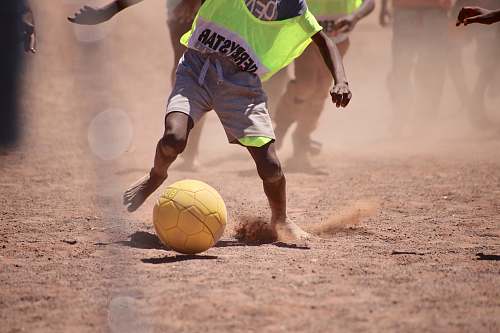 person child playing soccer sphere