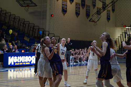 person female basketball players playing on robinson court apparel