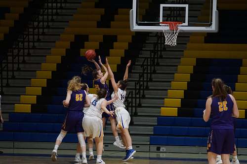 person female playing basketball apparel