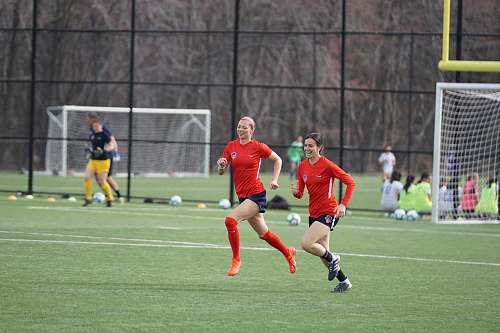 person female soccer player on field people