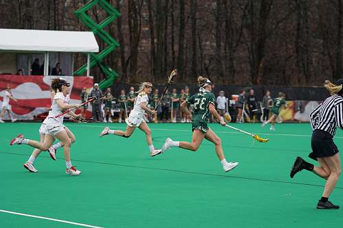 person four women running on field people