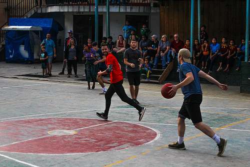 person group of men playing basketball apparel