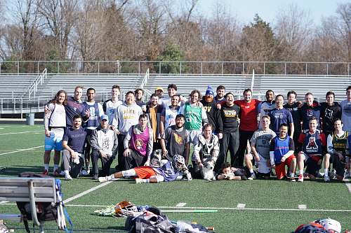 apparel group of people on field clothing