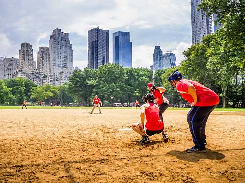 person group of people playing baseball at daytime sport