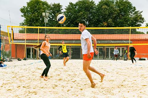 person group of people playing volleyball apparel