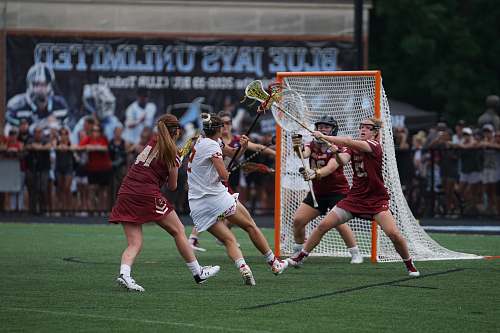 people group of women playing lacrosse person