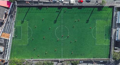 building high-angle photography of game field at daytime field
