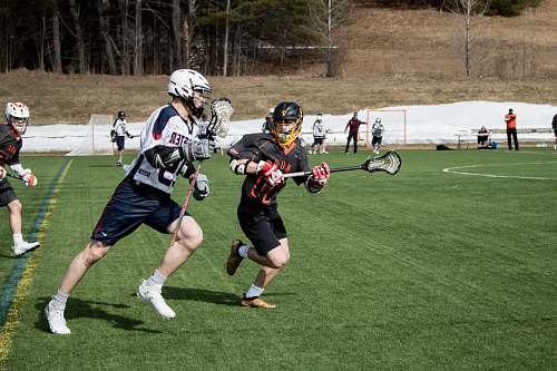 person lacrosse players on sports field people