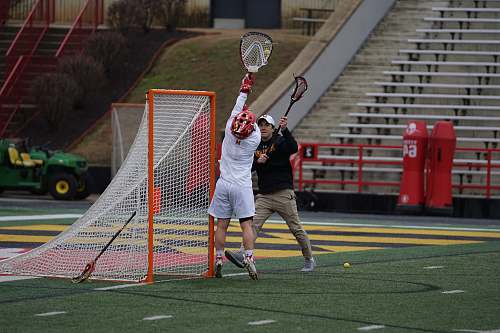 person man playing lacrosse sport