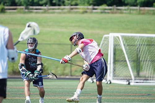 person man playing on field apparel