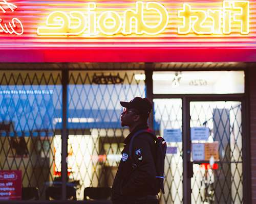 people man standing on First Choice storefront person