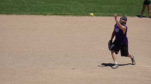 apparel man throwing baseball person
