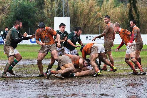 person men playinf on field apparel