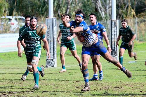 person men playing rugby people