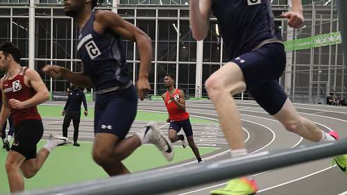 person men running on field sports