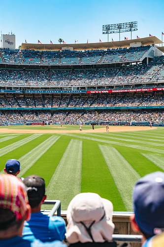 person people at the baseball stadium during day building