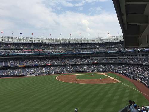 person people in stadium watching game building