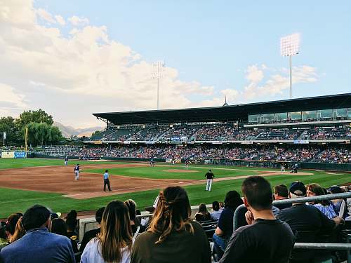 person people playing baseball during daytime people