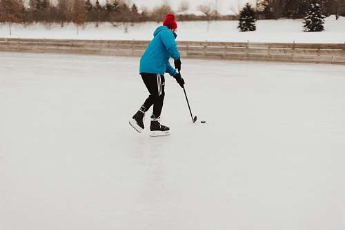 person person playing hockey stick sport