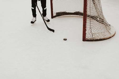 person person playing ice hockey people