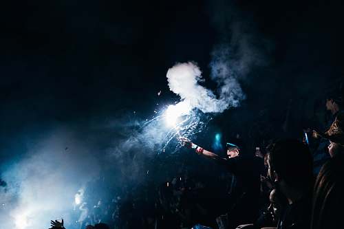 person person playing with fireworks people