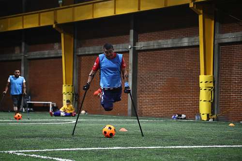 person person with disability playing soccer people