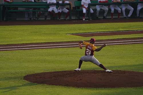 person pitcher on mound building