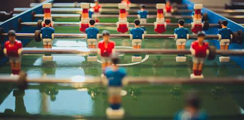 person red versus blue team foosball table sport