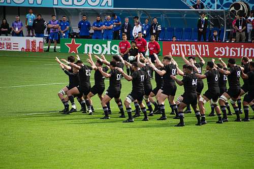 person rugby team dancing in the field people