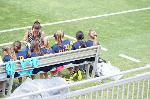 person soccer bench player people