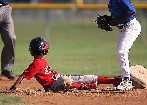 person two boys playing baseball baseball