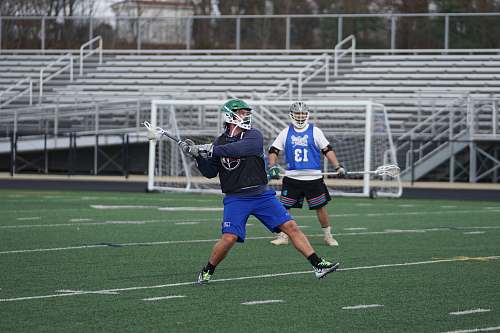 person two lacrosse player on field apparel
