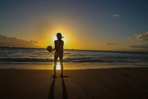 person woman's silhouette at a beach people