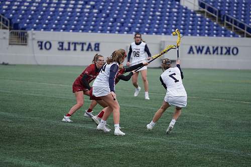 person women playing field hockey people