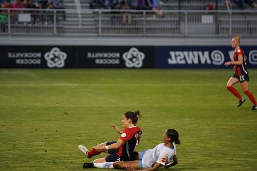 person women playing soccer people