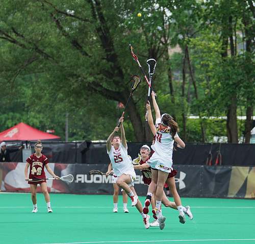 person women's lacrosse competition people