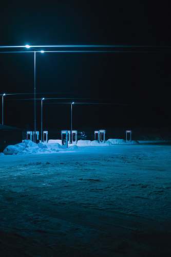 nature four gray light posts outdoors